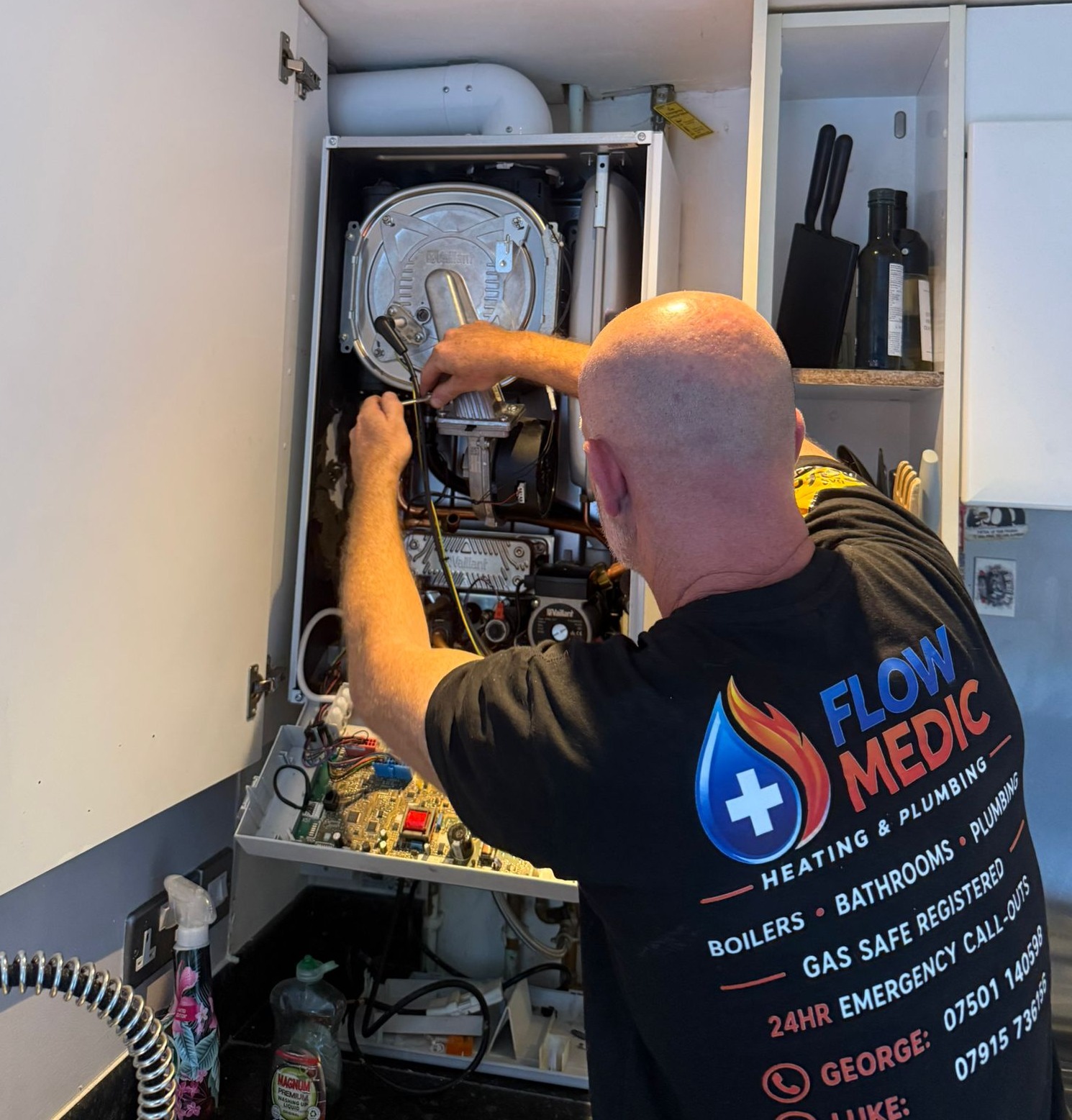 George working on a boiler